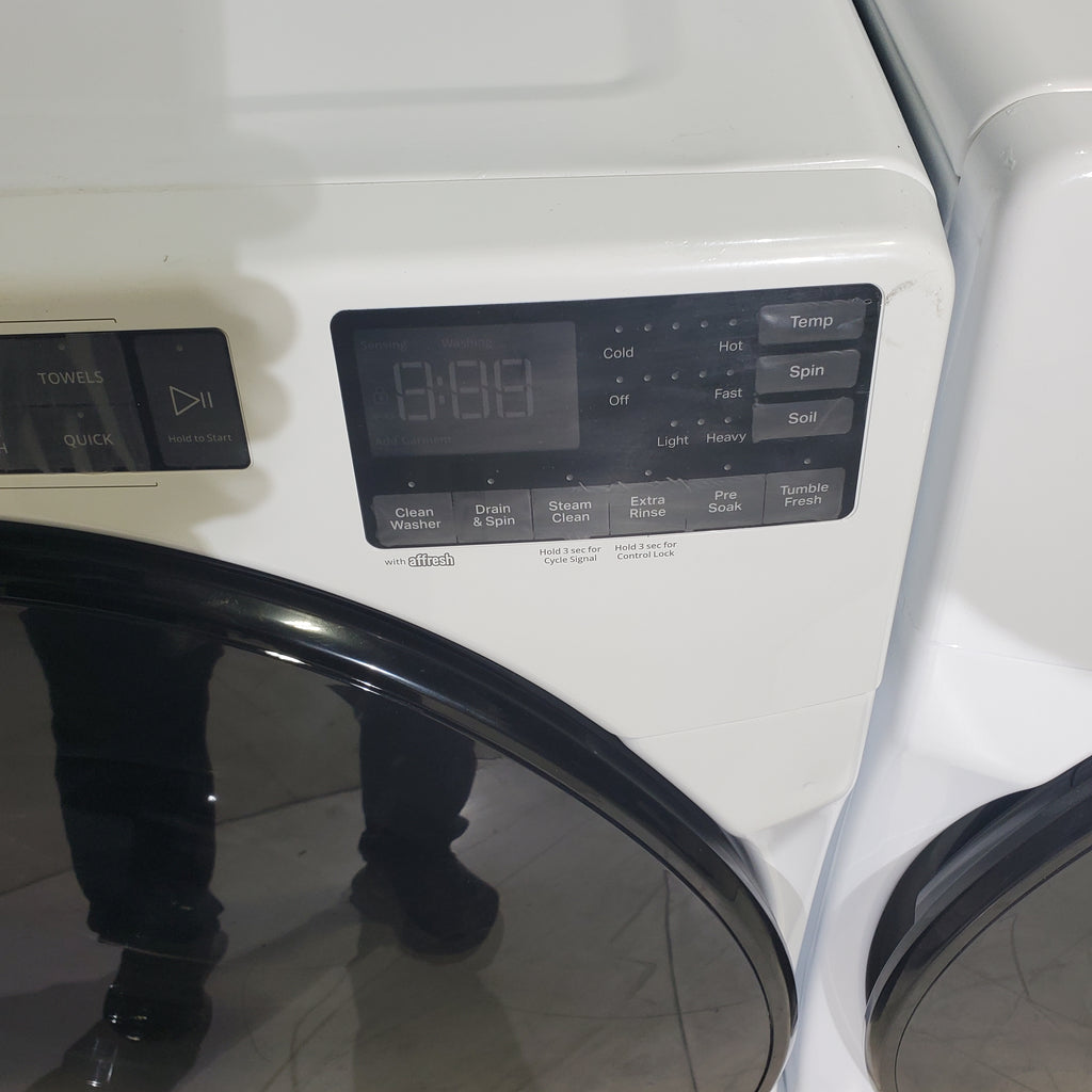 Pictures of Whirlpool ENERGY STAR 4.5 Cu. Ft. Front Load Washer with Quick Wash Cycle and 7.4 Cu. Ft. ENERGY STAR Electric Wrinkle Shield Dryer with Advanced Moisture Sensing - Scratch and Dent - Minor - Neu Appliance Outlet - Discount Appliance Outlet in Austin, Tx