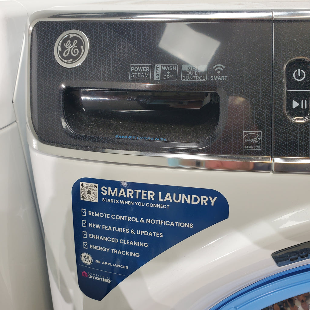 Pictures of GE ENERGY STAR 5.0 cu. ft. Capacity Smart Front Load Steam Washer with SmartDispense  and GE ENERGY STAR 7.8 cu. ft. Capacity Smart Front Load Electric Dryer with Sanitize Cycle - Scratch and Dent - Moderate / Minor - Neu Appliance Outlet - Discount Appliance Outlet in Austin, Tx