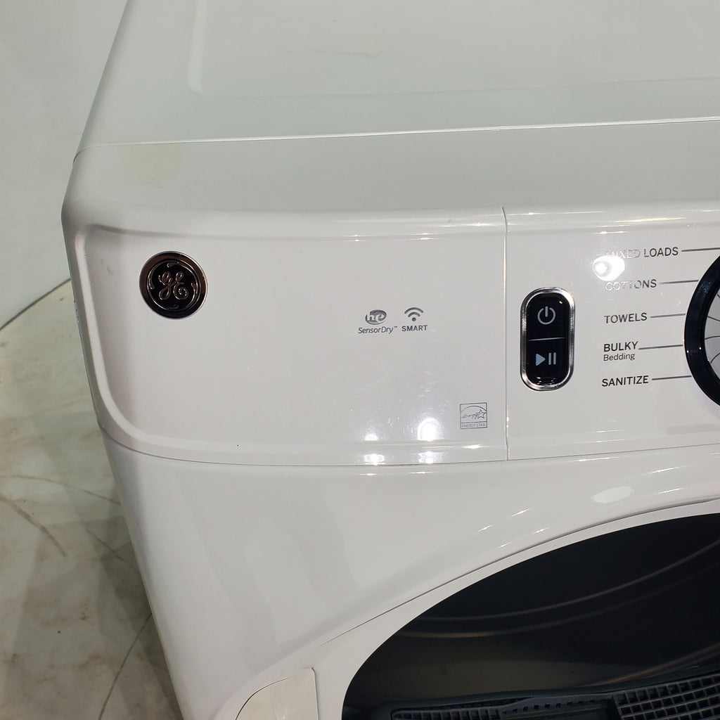 Pictures of GE ENERGY STAR 5.0 cu. ft. Capacity Smart Front Load Steam Washer with SmartDispense  and GE ENERGY STAR 7.8 cu. ft. Capacity Smart Front Load Electric Dryer with Sanitize Cycle - Scratch and Dent - Moderate / Minor - Neu Appliance Outlet - Discount Appliance Outlet in Austin, Tx