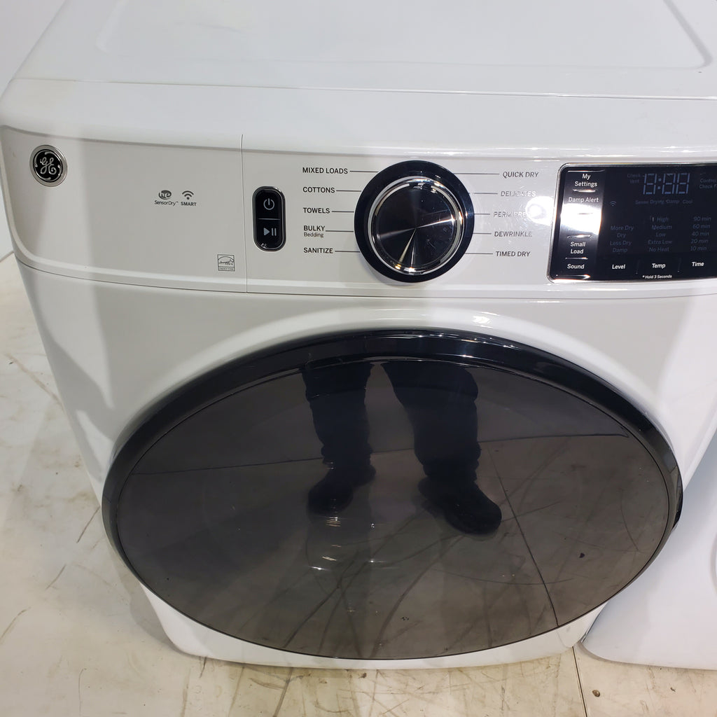 Pictures of GE ENERGY STAR 5.0 cu. ft. Capacity Smart Front Load Steam Washer with SmartDispense  and GE ENERGY STAR 7.8 cu. ft. Capacity Smart Front Load Electric Dryer with Sanitize Cycle - Scratch and Dent - Moderate / Minor - Neu Appliance Outlet - Discount Appliance Outlet in Austin, Tx