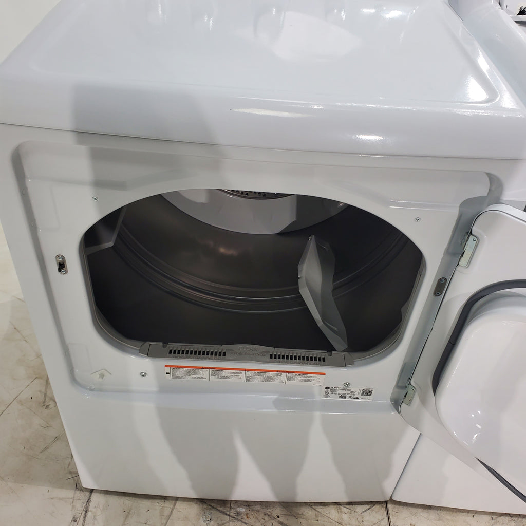 Pictures of ENERGY STAR GE. 4.2 cu. ft. Top Load Washing Machine with Stain Removal Guide and HE GE 7.2 cu. ft. Electric Dryer with HE Sensor Dry - Certified Refurbished - Neu Appliance Outlet - Discount Appliance Outlet in Austin, Tx