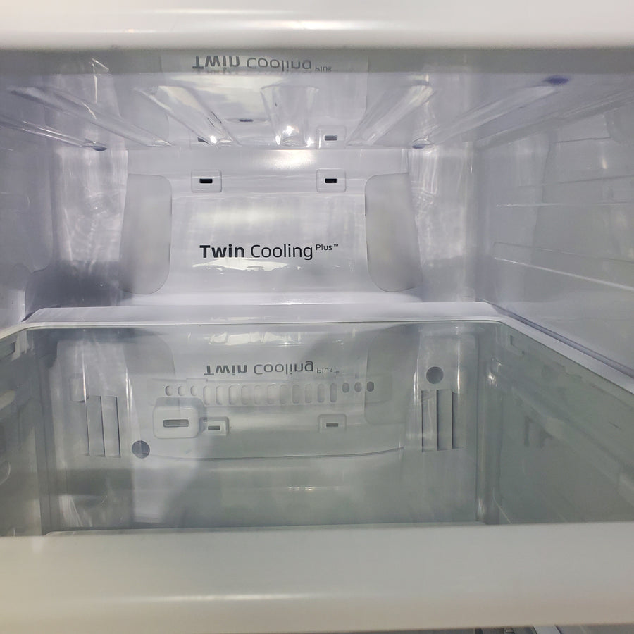 Stainless Steel ENERGY STAR Samsung 24.5 cu. ft. Side by Side Refrigerator with Exterior Ice and Water Dispenser - Certified Refurbished