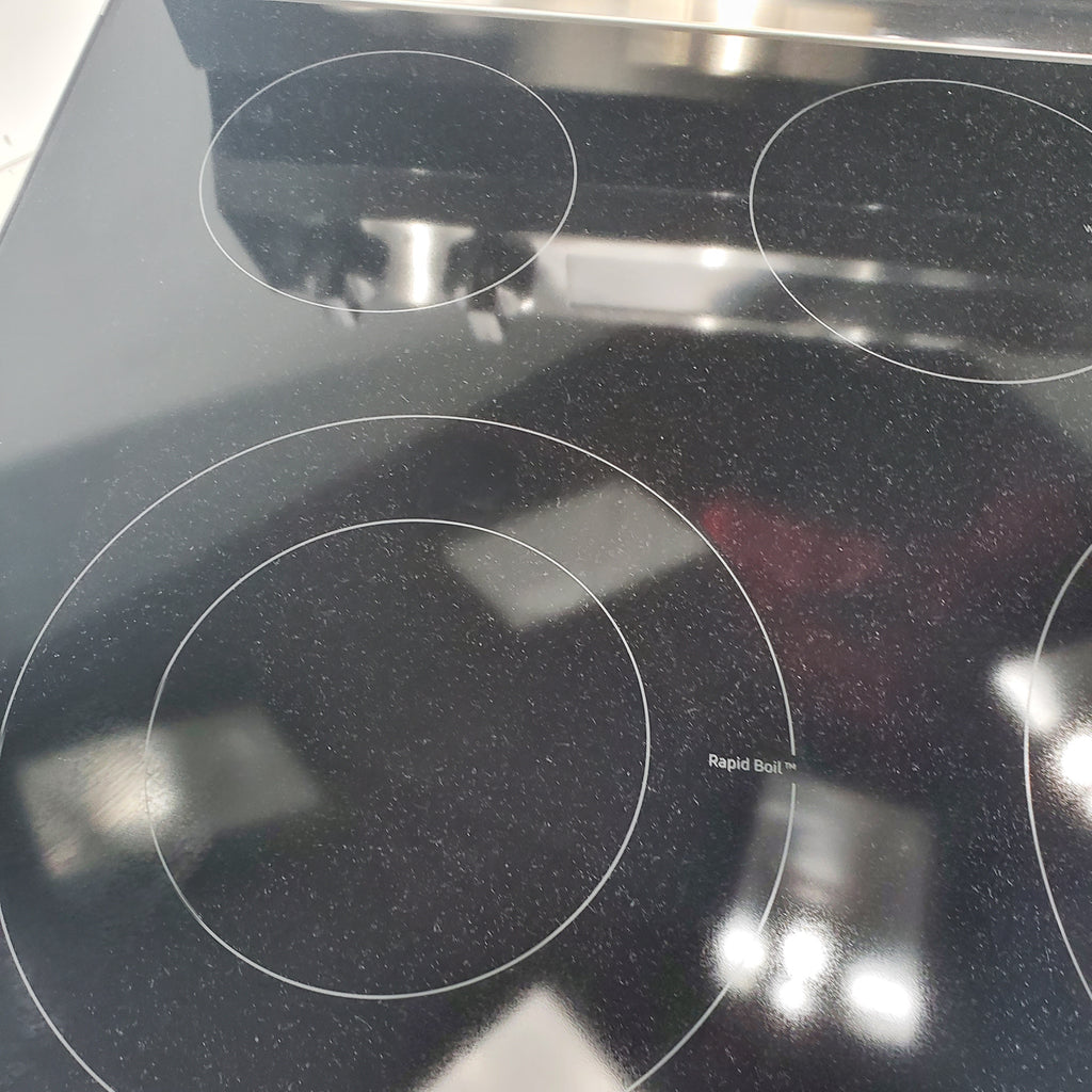 Pictures of Samsung 6.3 cu. ft. Smart Freestanding Electric Range with No-Preheat Air Fry & Convection in Stainless Steel - Scratch & Dent - Minor - Neu Appliance Outlet - Discount Appliance Outlet in Austin, Tx