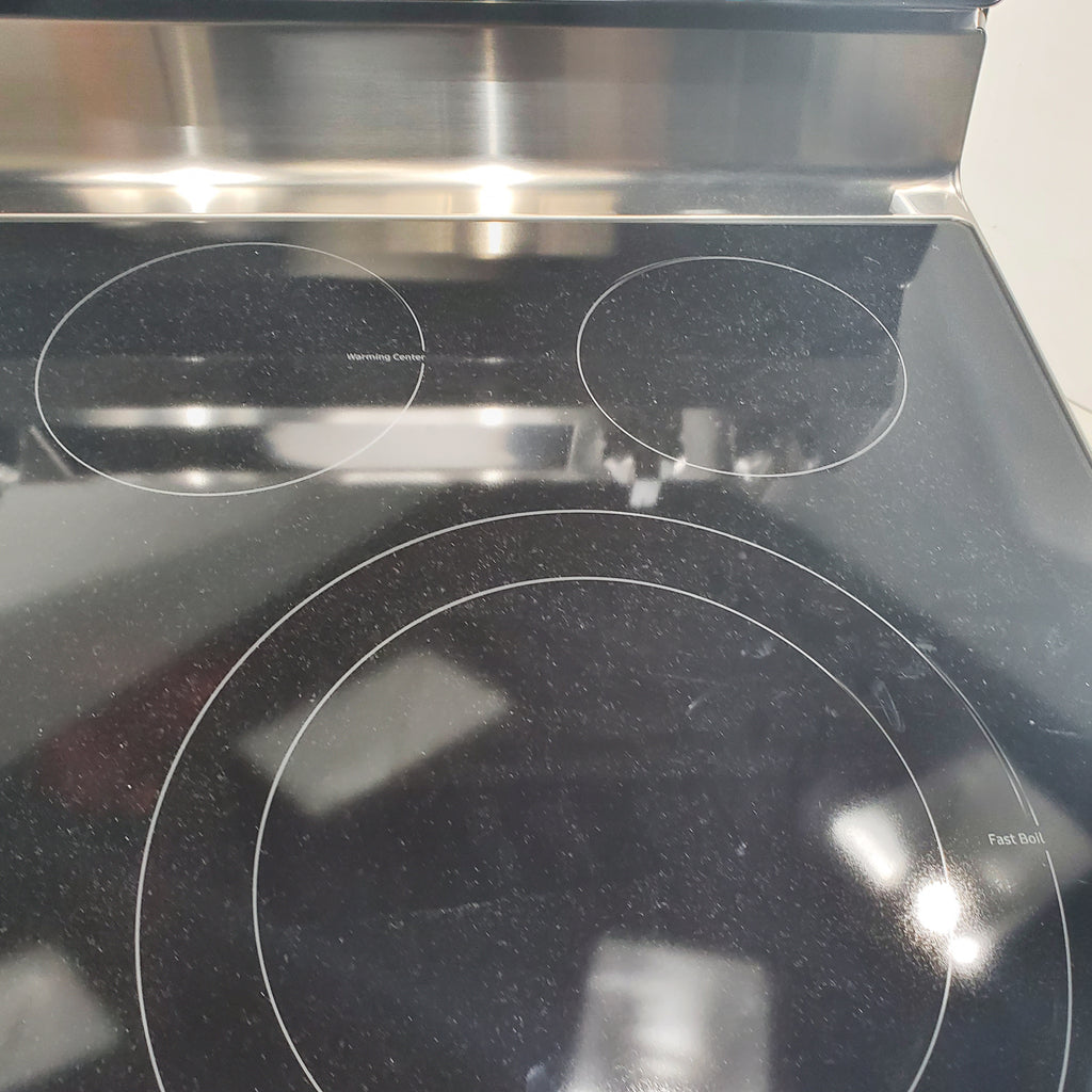 Pictures of Samsung 6.3 cu. ft. Smart Freestanding Electric Range with No-Preheat Air Fry & Convection in Stainless Steel - Scratch & Dent - Minor - Neu Appliance Outlet - Discount Appliance Outlet in Austin, Tx