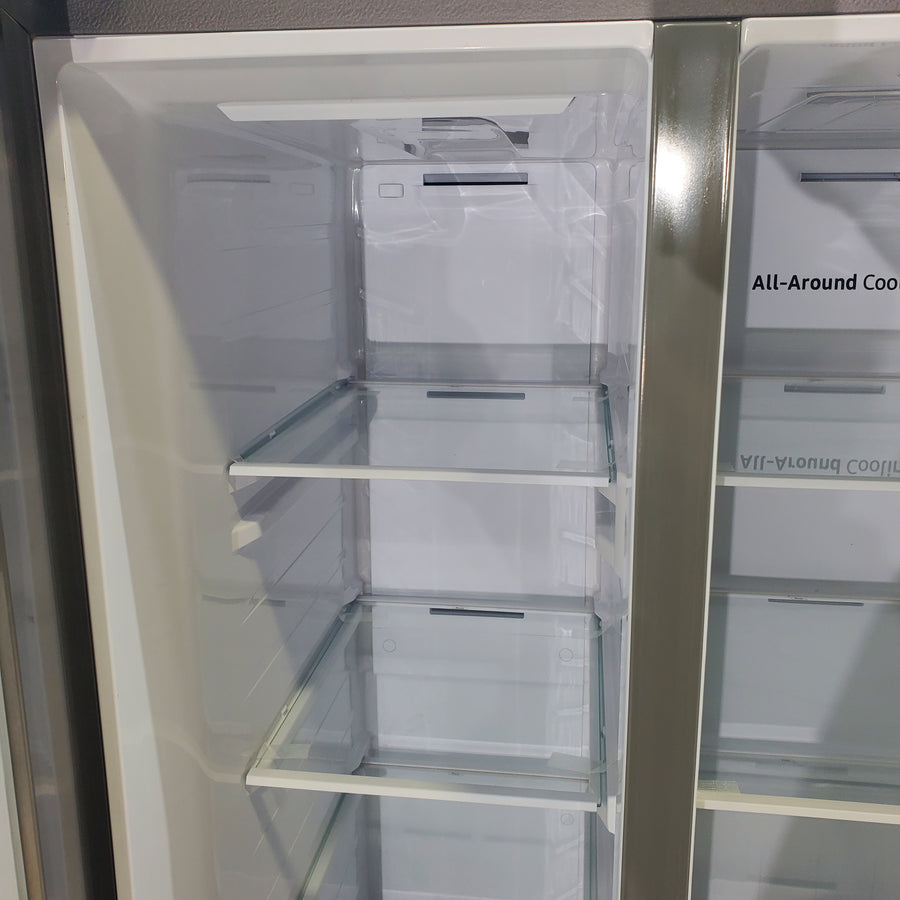 Fingerprint Resistant Stainless Steel ENERGY STAR Samsung 27.4 cu. ft. Side by Side Refrigerator with Exterior Water and Ice Dispenser - Scratch & Dent - Minor