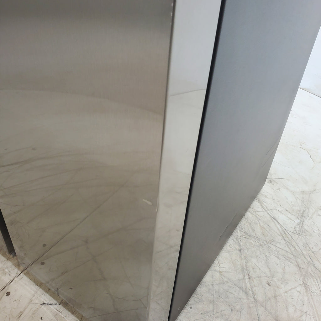 Pictures of Fingerprint Resistant Stainless Steel ENERGY STAR Samsung 27.4 cu. ft. Side by Side Refrigerator with Exterior Water and Ice Dispenser - Scratch & Dent - Minor - Neu Appliance Outlet - Discount Appliance Outlet in Austin, Tx