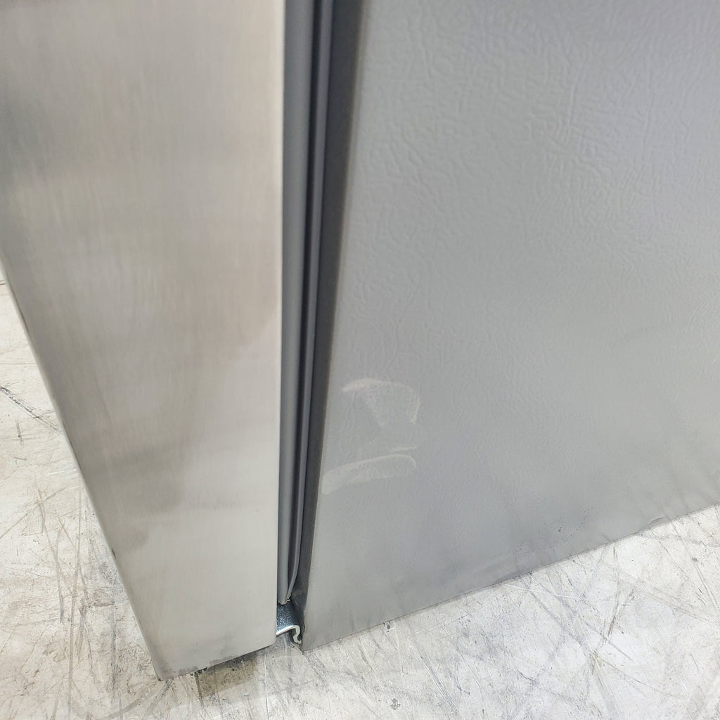 Pictures of Stainless Steel ENERGY STAR Frigidaire 25.6 cu. ft. Side by Side Refrigerator with Exterior Water and Ice Dispenser - Scratch & Dent - Moderate - Neu Appliance Outlet - Discount Appliance Outlet in Austin, Tx