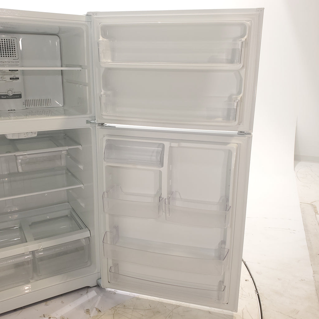 Pictures of 33" Wide GE® White 21.9 Cu. Ft. Garage Ready Top-Freezer Refrigerator - Scratch & Dent - Minor - Neu Appliance Outlet - Discount Appliance Outlet in Austin, Tx