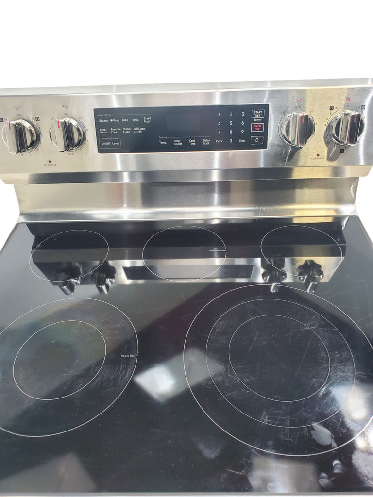 Pictures of Stainless Steel Samsung 5.9 cu. ft. Freestanding 5 Heating Element Smooth Cooktop Self Cleaning Electric Range with True Convection  - Certified Refurbished - Neu Appliance Outlet - Discount Appliance Outlet in Austin, Tx