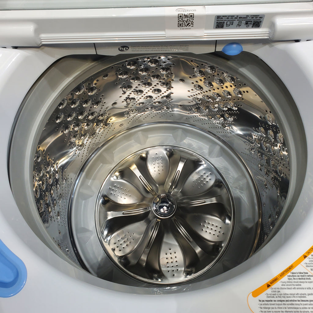 Pictures of LG 5.0 cu. ft. Mega Capacity Top Load Washer with TurboDrum™ Technology and 7.3 cu. ft. Ultra Large Capacity Electric Dryer with Sensor Dry Technology - Scratch & Dent - Minor - Neu Appliance Outlet - Discount Appliance Outlet in Austin, Tx