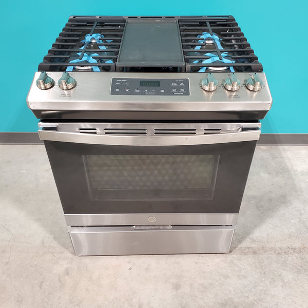 GE® Stainless Steel 30" Slide-In Front Control Gas Range with Edge - to - Edge Cooktop  and  Extra-Large Integrated Griddle JGSS66SELSS - Scratch & Dent - Moderate