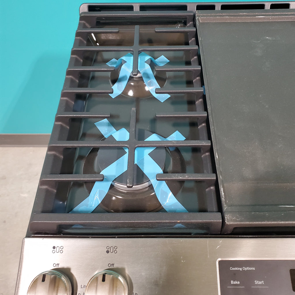 Pictures of GE® Stainless Steel 30" Slide-In Front Control Gas Range with Edge - to - Edge Cooktop and Extra-Large Integrated Griddle JGSS66SELSS - Scratch & Dent - Moderate - Neu Appliance Outlet - Discount Appliance Outlet in Austin, Tx
