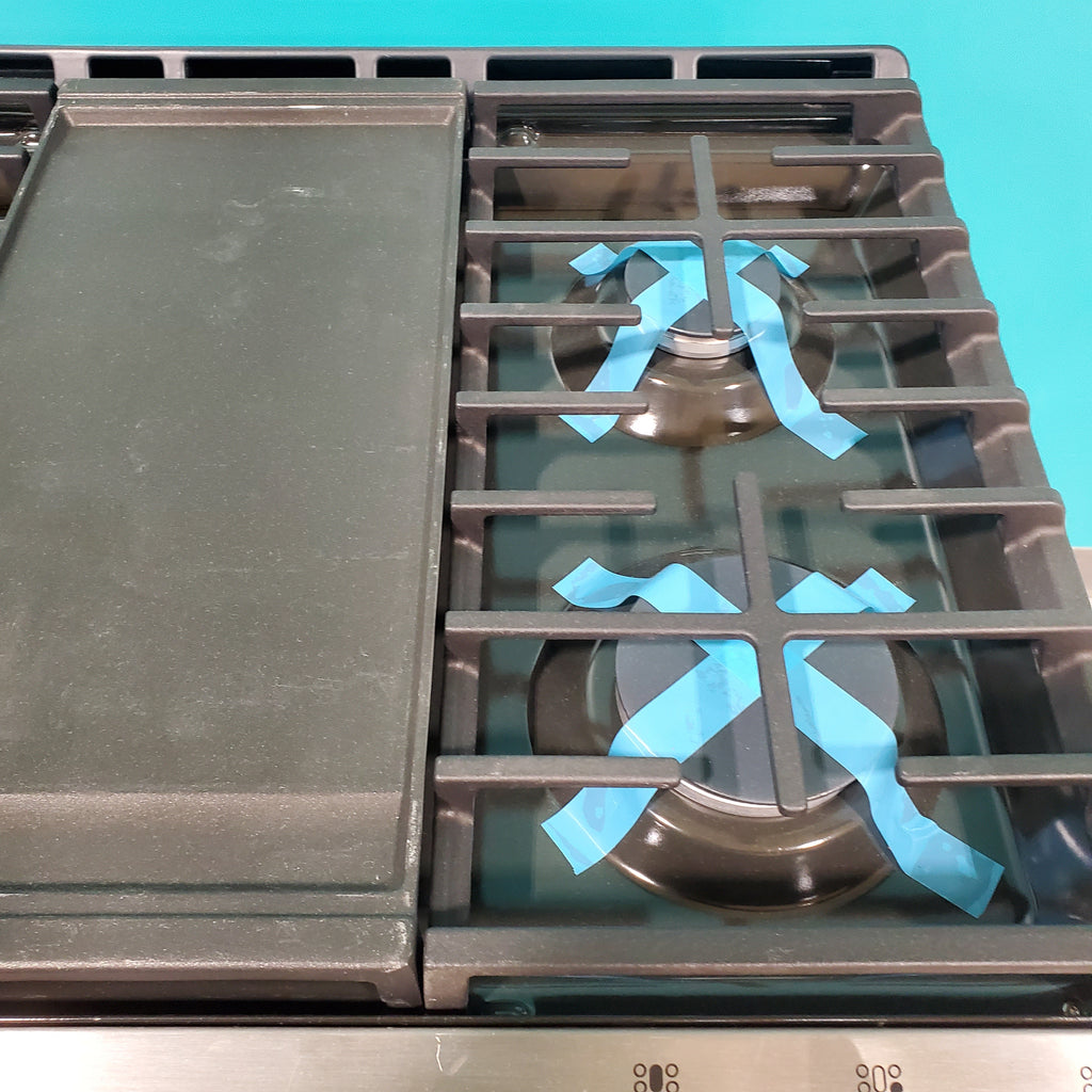 Pictures of GE® Stainless Steel 30" Slide-In Front Control Gas Range with Edge - to - Edge Cooktop and Extra-Large Integrated Griddle JGSS66SELSS - Scratch & Dent - Moderate - Neu Appliance Outlet - Discount Appliance Outlet in Austin, Tx