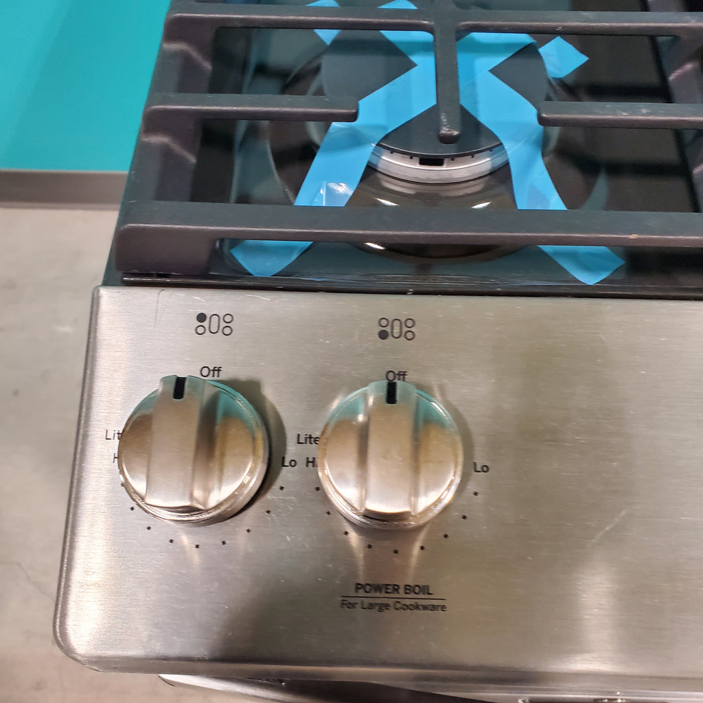 Pictures of GE® Stainless Steel 30" Slide-In Front Control Gas Range with Edge - to - Edge Cooktop and Extra-Large Integrated Griddle JGSS66SELSS - Scratch & Dent - Moderate - Neu Appliance Outlet - Discount Appliance Outlet in Austin, Tx