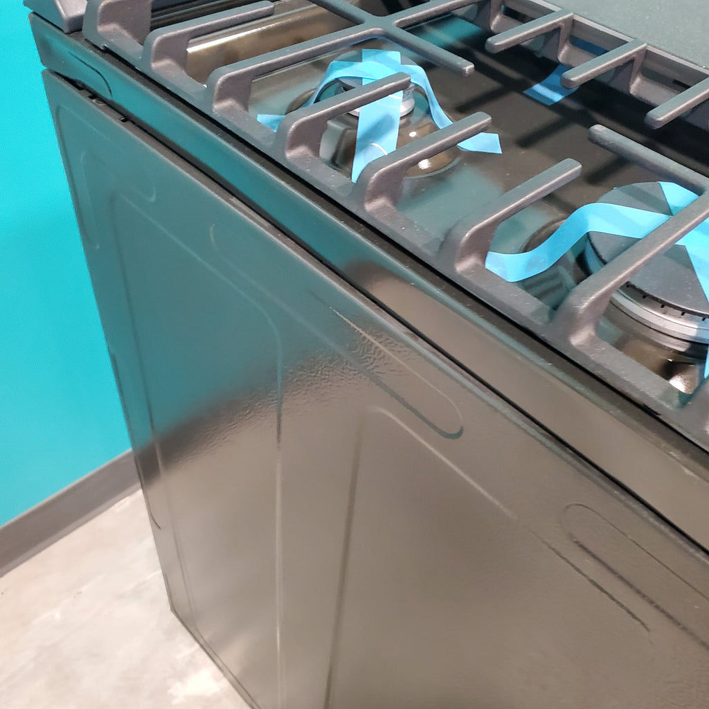 Pictures of GE® Stainless Steel 30" Slide-In Front Control Gas Range with Edge - to - Edge Cooktop and Extra-Large Integrated Griddle JGSS66SELSS - Scratch & Dent - Moderate - Neu Appliance Outlet - Discount Appliance Outlet in Austin, Tx