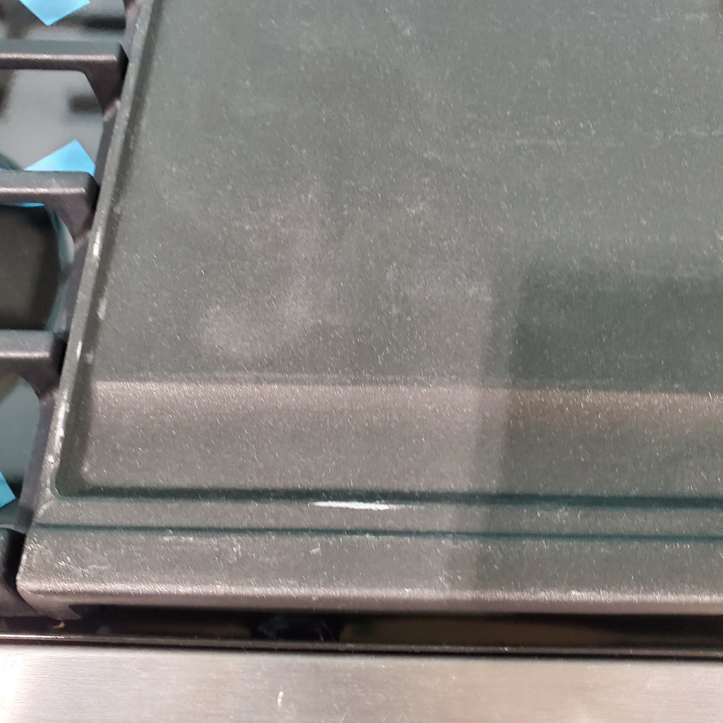 Pictures of GE® Stainless Steel 30" Slide-In Front Control Gas Range with Edge - to - Edge Cooktop and Extra-Large Integrated Griddle JGSS66SELSS - Scratch & Dent - Moderate - Neu Appliance Outlet - Discount Appliance Outlet in Austin, Tx