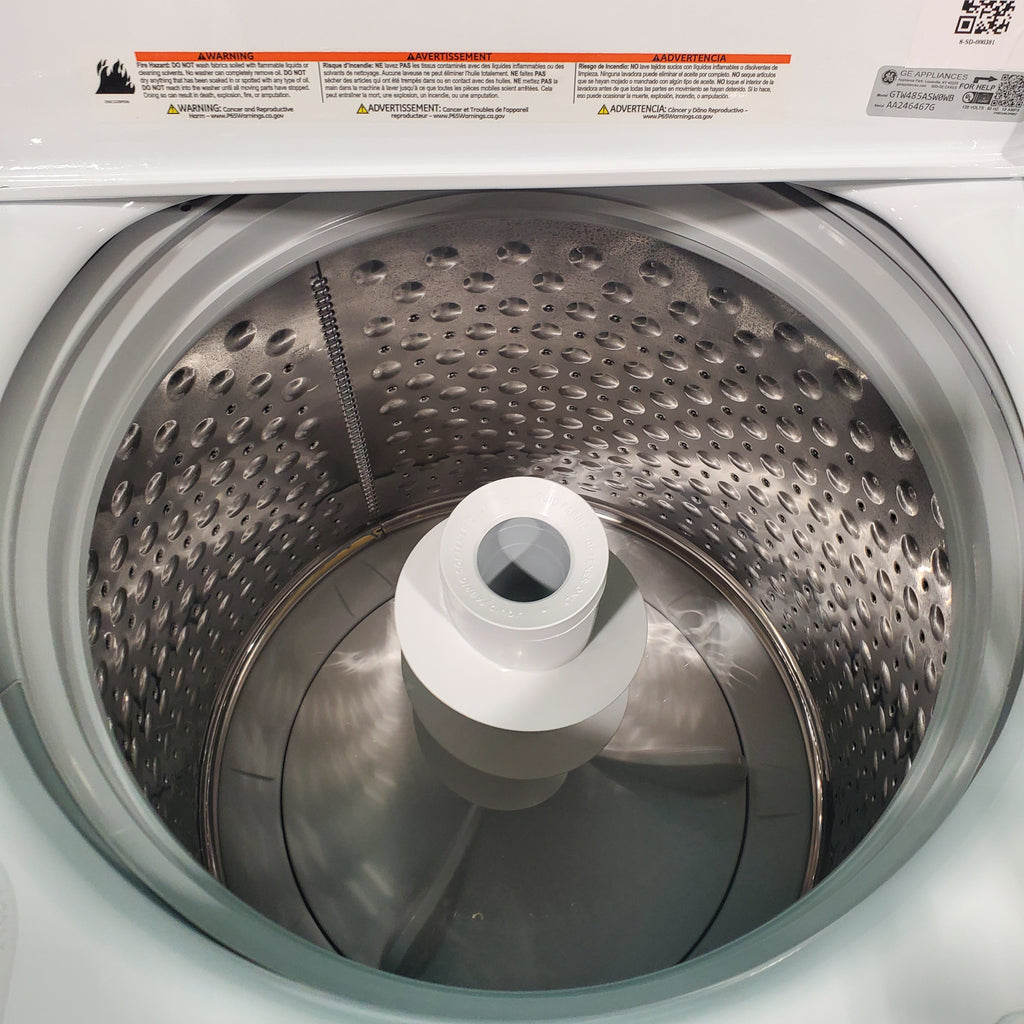 Pictures of GE 4.5 cu. ft. Capacity Washer with Stainless Steel Basket, Cold Plus and Wash Boost and GE 7.2 cu. ft. Capacity Electric Dryer with Up To 120 ft. Venting and Extended Tumble - Open Box - Neu Appliance Outlet - Discount Appliance Outlet in Austin, Tx