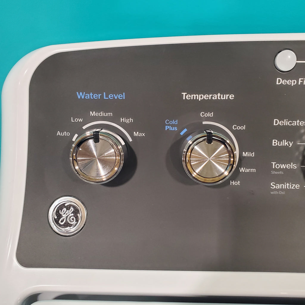 Pictures of GE 4.5 cu. ft. Capacity Washer with Stainless Steel Basket, Cold Plus and Wash Boost and GE 7.2 cu. ft. Capacity Electric Dryer with Up To 120 ft. Venting and Extended Tumble - Open Box - Neu Appliance Outlet - Discount Appliance Outlet in Austin, Tx
