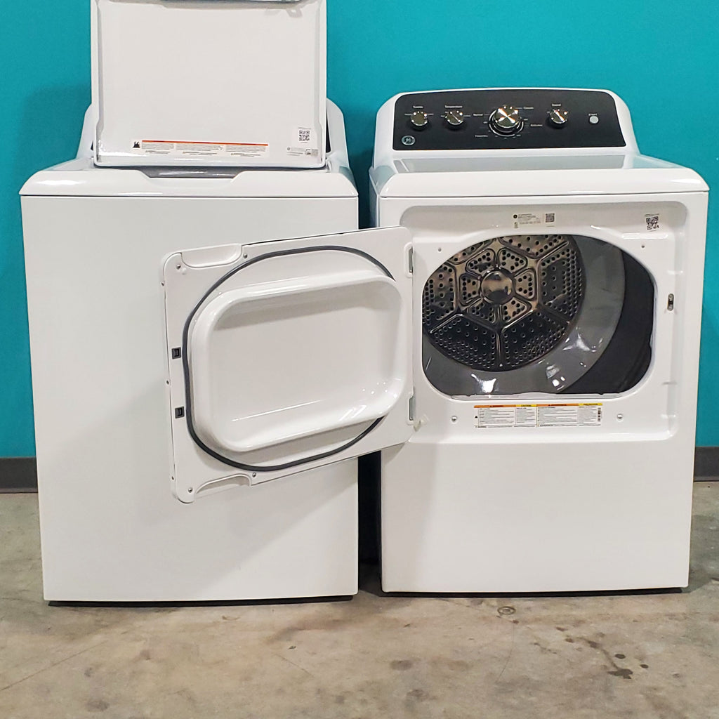 Pictures of GE 4.5 cu. ft. Capacity Washer with Stainless Steel Basket, Cold Plus and Wash Boost and GE 7.2 cu. ft. Capacity Electric Dryer with Up To 120 ft. Venting and Extended Tumble - Open Box - Neu Appliance Outlet - Discount Appliance Outlet in Austin, Tx