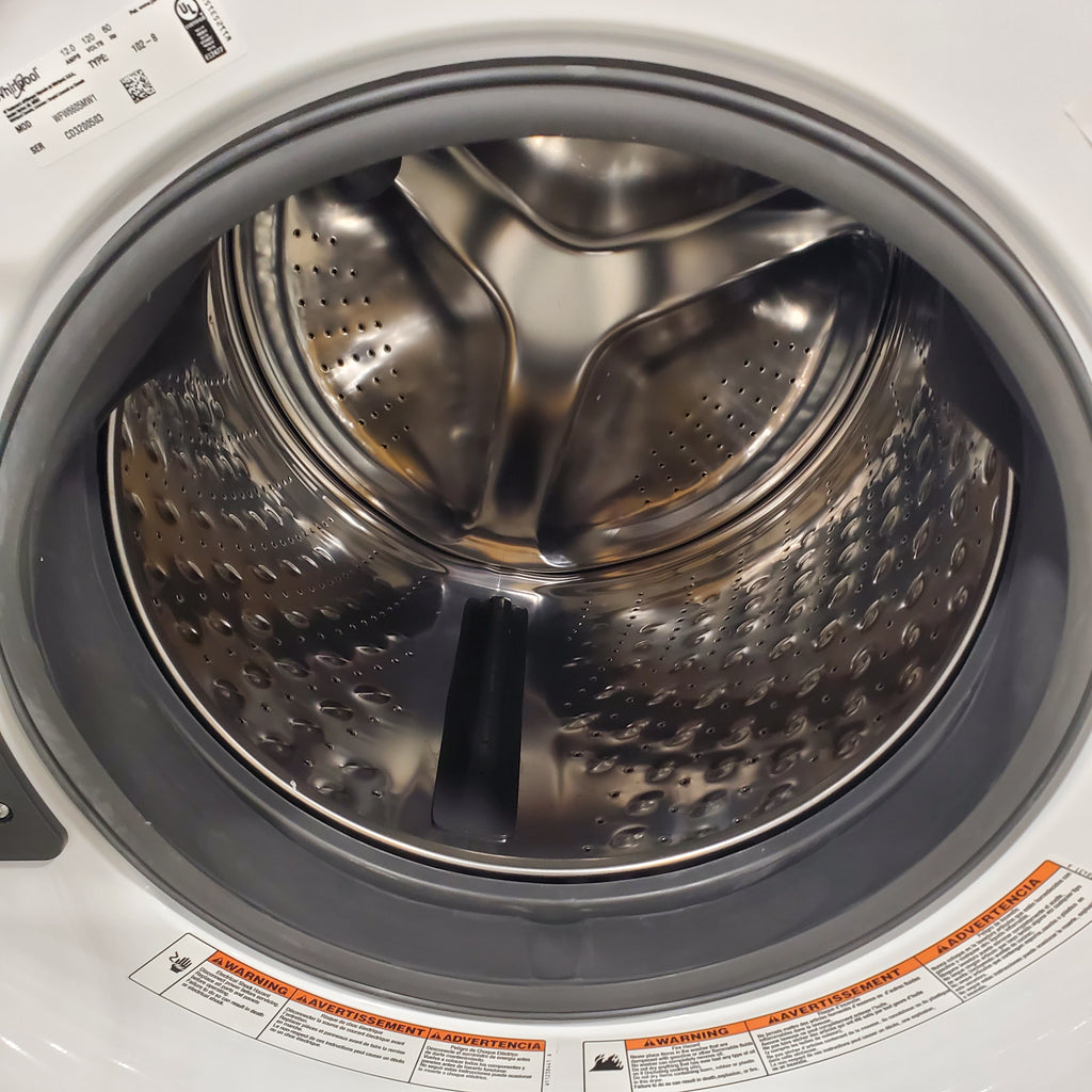 Pictures of Whirlpool Large Capacity 5.0 Cu. Ft. Front Load Washer with Quick Wash Cycle and Sanitize Cycle in White WFW6605MW - Scratch and Dent (Minor) and 7.4 Cu. Ft. Electric Wrinkle Shield Dryer with Advanced Moisture Sensing WED5605MW - Open Box - Neu Appliance Outlet - Discount Appliance Outlet in Austin, Tx