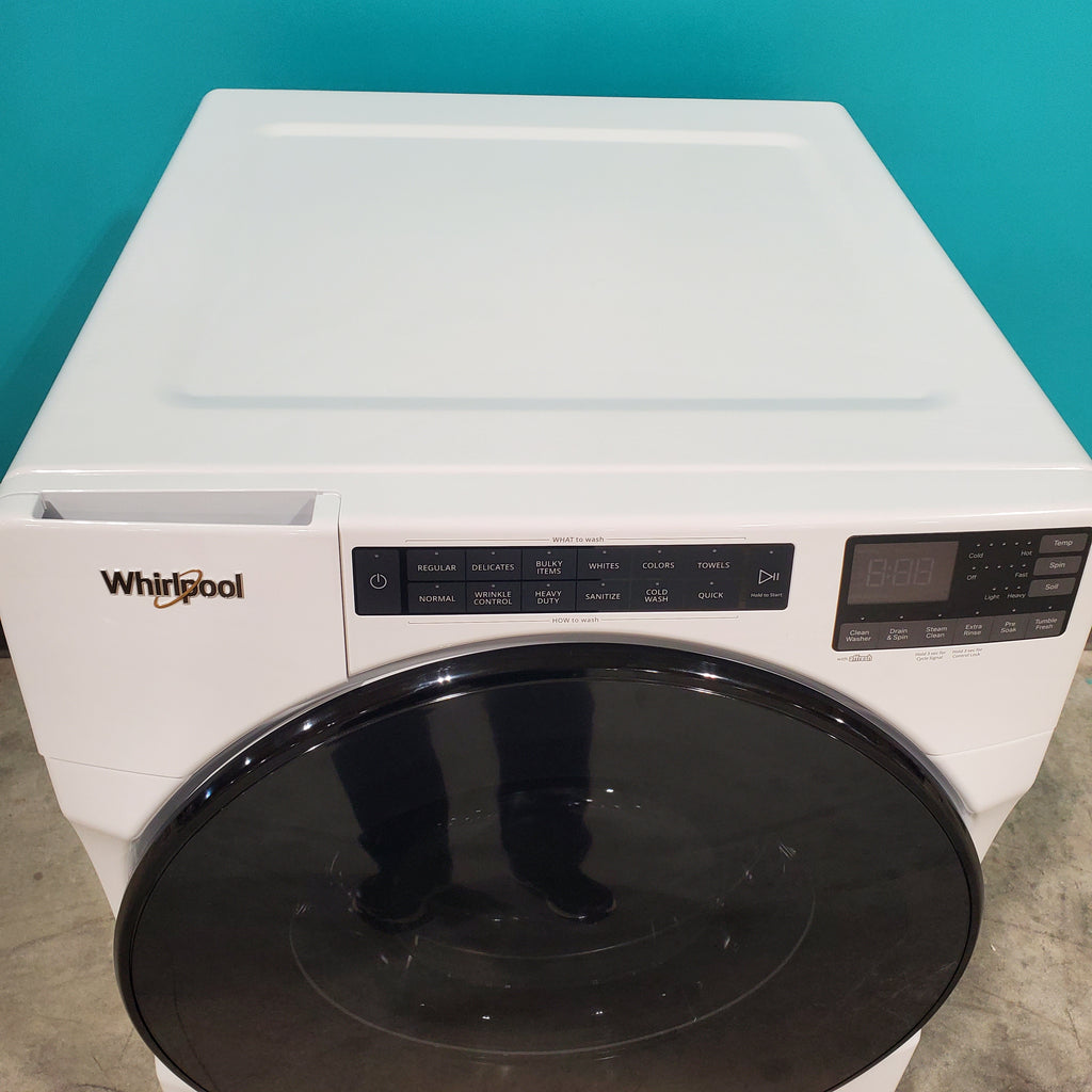 Pictures of Whirlpool Large Capacity 5.0 Cu. Ft. Front Load Washer with Quick Wash Cycle and Sanitize Cycle in White WFW6605MW - Scratch and Dent (Minor) and 7.4 Cu. Ft. Electric Wrinkle Shield Dryer with Advanced Moisture Sensing WED5605MW - Open Box - Neu Appliance Outlet - Discount Appliance Outlet in Austin, Tx