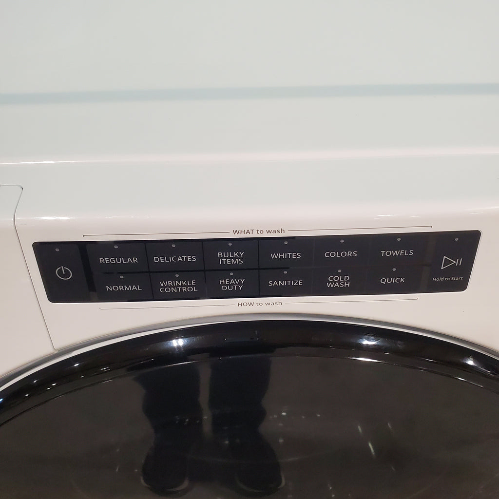 Pictures of Whirlpool Large Capacity 5.0 Cu. Ft. Front Load Washer with Quick Wash Cycle and Sanitize Cycle in White WFW6605MW - Scratch and Dent (Minor) and 7.4 Cu. Ft. Electric Wrinkle Shield Dryer with Advanced Moisture Sensing WED5605MW - Open Box - Neu Appliance Outlet - Discount Appliance Outlet in Austin, Tx