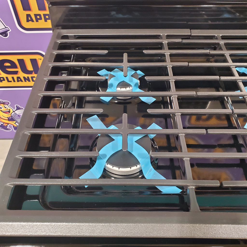 Pictures of Whirlpool Stainless 5.1 Cu. Ft. Freestanding Gas Range with Broiler Drawer and Two Speed Heat Burners WFG320M0MS - Scratch & Dent - Minor - Neu Appliance Outlet - Discount Appliance Outlet in Austin, Tx