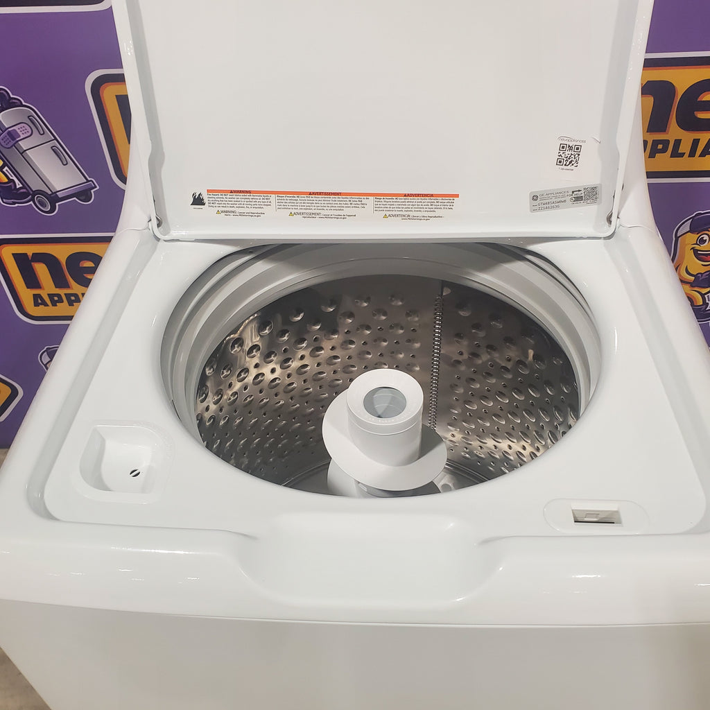 Pictures of GE 4.5 cu. ft. Capacity Washer with Stainless Steel Basket, Cold Plus and Wash Boost and GE 7.2 cu. ft. Capacity Electric Dryer with Up To 120 ft. Venting and Extended Tumble - Neu Appliance Outlet - Discount Appliance Outlet in Austin, Tx