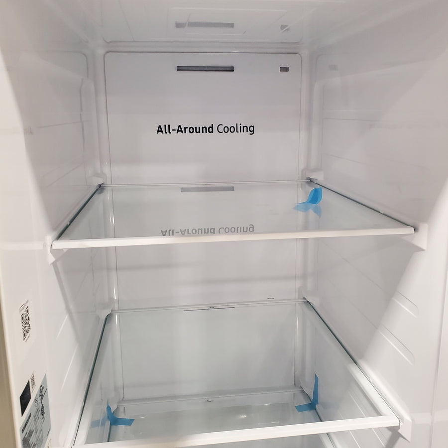 Fingerprint Resistant Stainless Steel ENERGY STAR Samsung 27.4 cu. ft. Side by Side Refrigerator with Exterior Water and Ice Dispenser RS27T5200SR - Scratch & Dent - Minor