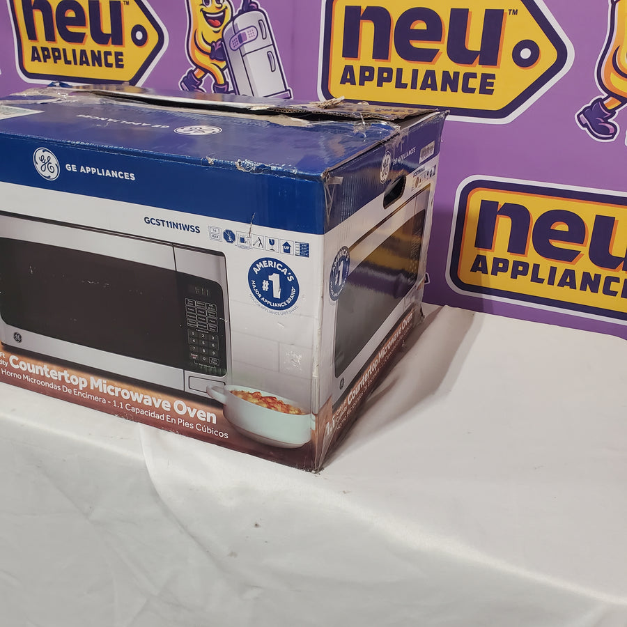 GE 1.1-cu ft 950-Watt Countertop Microwave in Stainless Steel GCST11N1WSS - Open Box
