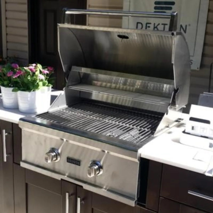 Coyote 28 Inch Built-in Gas Grill with Infinity Burners, Warming Rack, Heat Control Grids, 40,000 Total BTU, Interior Hood Lights, 640 sq. in. Cooking Area and Stainless Steel Grates C1C28LP - Scratch & Dent (Minor)