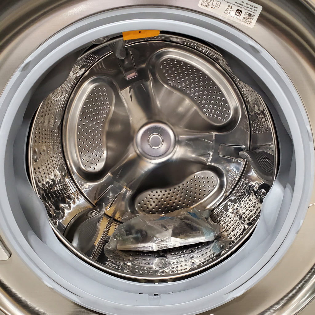 LG 4.5 cu. ft. Smart Front Load Washer with TurboWash® 360° and ezDispense® WM5700HVA - Scratch & Dent (MInor) and LG Smart Mega Capacity 7.8 Cu. Ft. Front Load Dryer with Dual Inverter Heat Pump Technology 16113 - DLHC5502V - Open Box
