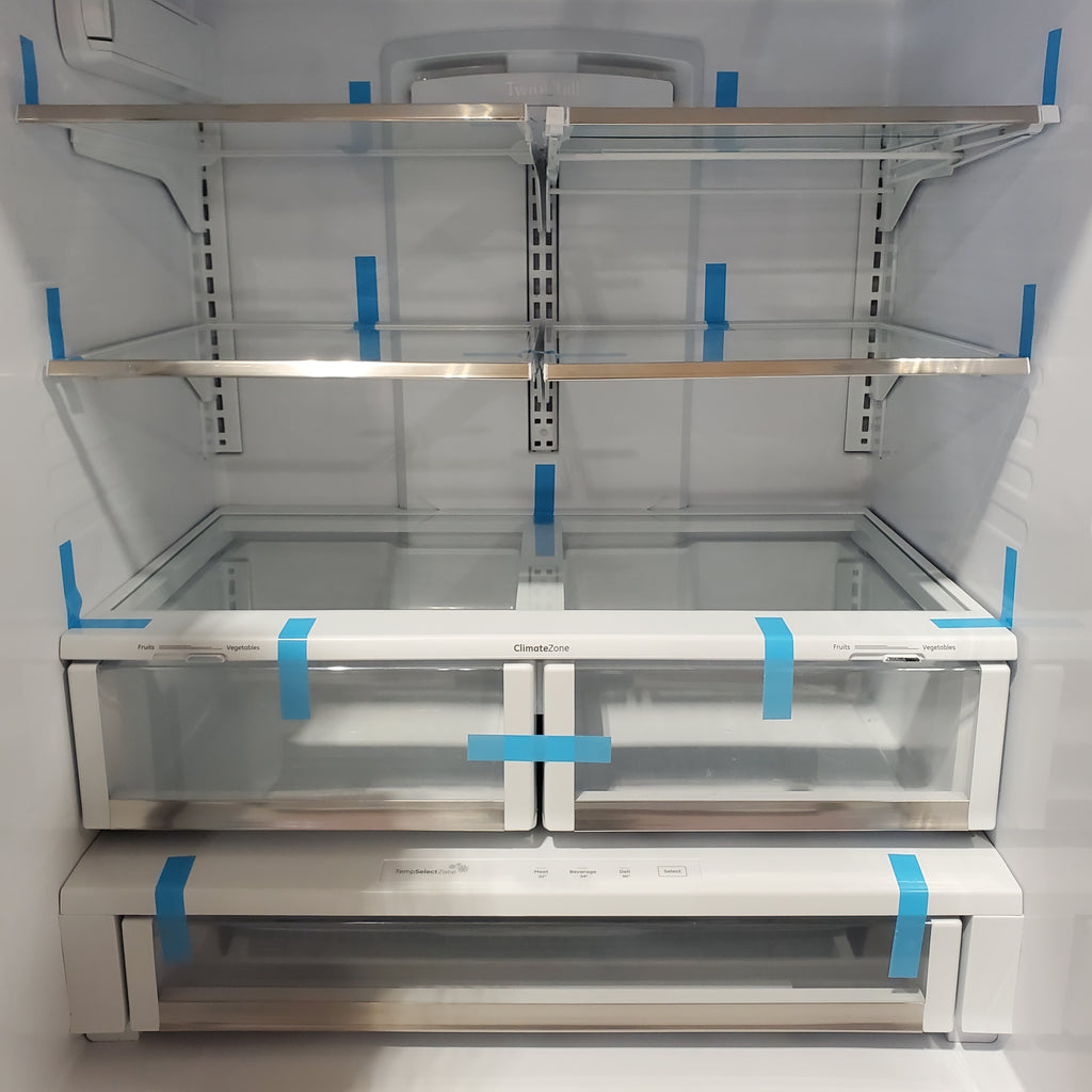 GE Cafe 27.8-cu ft French Door Refrigerator with Ice Maker, Water and Ice Dispenser ENERGY STAR in Stainless Steel 31131SD21 - CFE28TSHSS - Scratch & Dent (Minor)