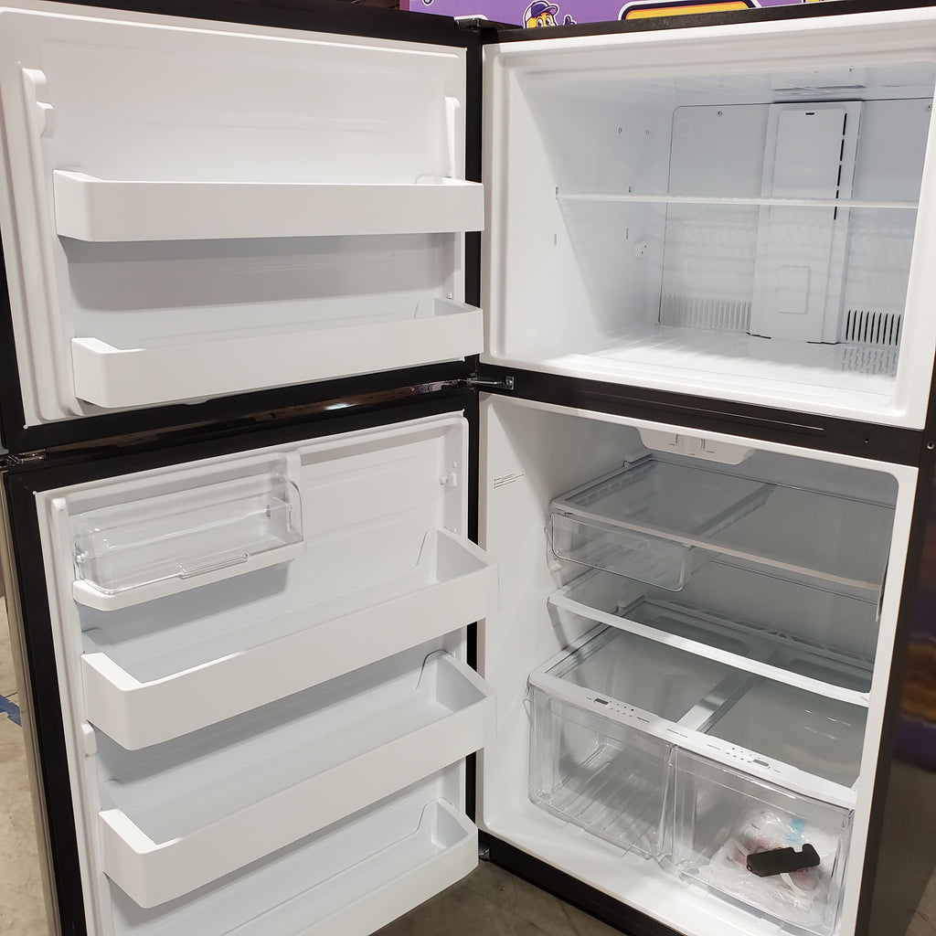 Pictures of GE® ENERGY STAR® 21.1 Cu. Ft. Top-Freezer Refrigerator 31133SD127 - GTE21GSHSS - Scratch & Dent (Major) - Neu Appliance Outlet - Discount Appliance Outlet in Austin, Tx