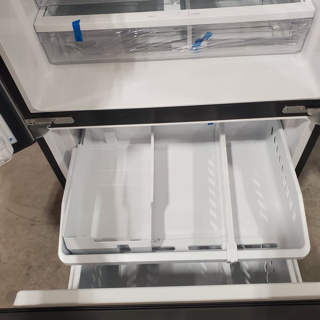 GE 33" Wide Stainless Steel ENERGY STAR 24.7 Cu. Ft. French-Door Refrigerator with Ice Maker and Water Dispenser GE9843 - GNE25JYKFS - New in Box