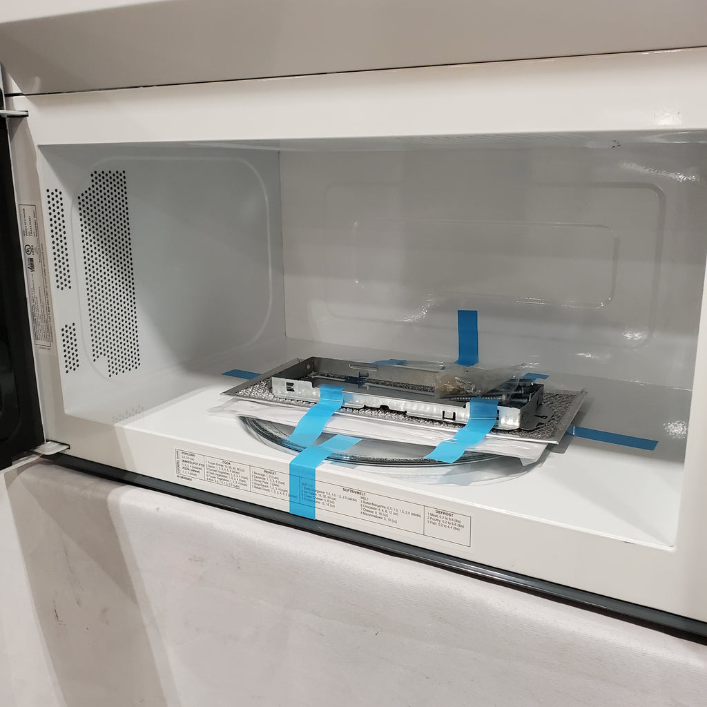 Pictures of Whirlpool 1.7 cu. ft. Microwave Hood Combination with Electronic Touch Controls 5SD287 - WMH31017HW - Scratch & Dent (Minor) - Neu Appliance Outlet - Discount Appliance Outlet in Austin, Tx