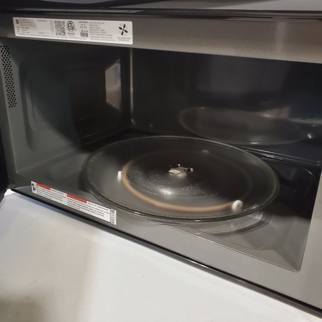 Pictures of GE Over-The-Range Sensor 1.9 Cu. Ft. Microwave Oven with Filter Indication Light and Steam Clean JVM7195SKSS - New in Box - Neu Appliance Outlet - Discount Appliance Outlet in Austin, Tx