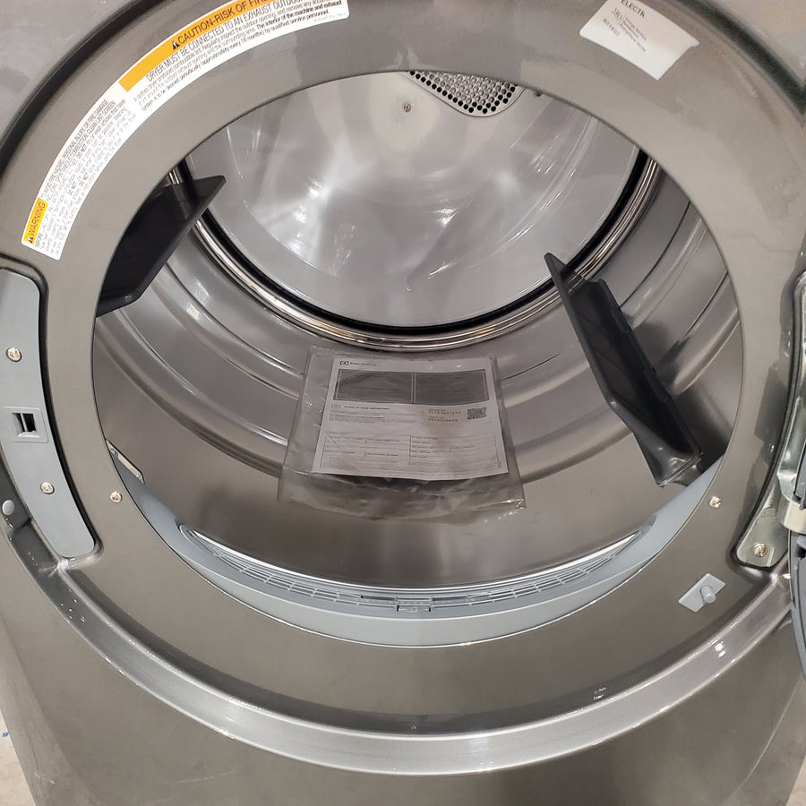 Electrolux Titanium Front Load 600 Series 4.5 Cu. Ft. Washer with Smartboost ELFW7637AT - Scratch & Dent (Moderate) and Electrolux 8 cu. ft. vented Front Load Stackable 600 Series Electric Dryer with LuxCare Dry 16248 - ELFE7637AT - Scratch & Dent (Minor)