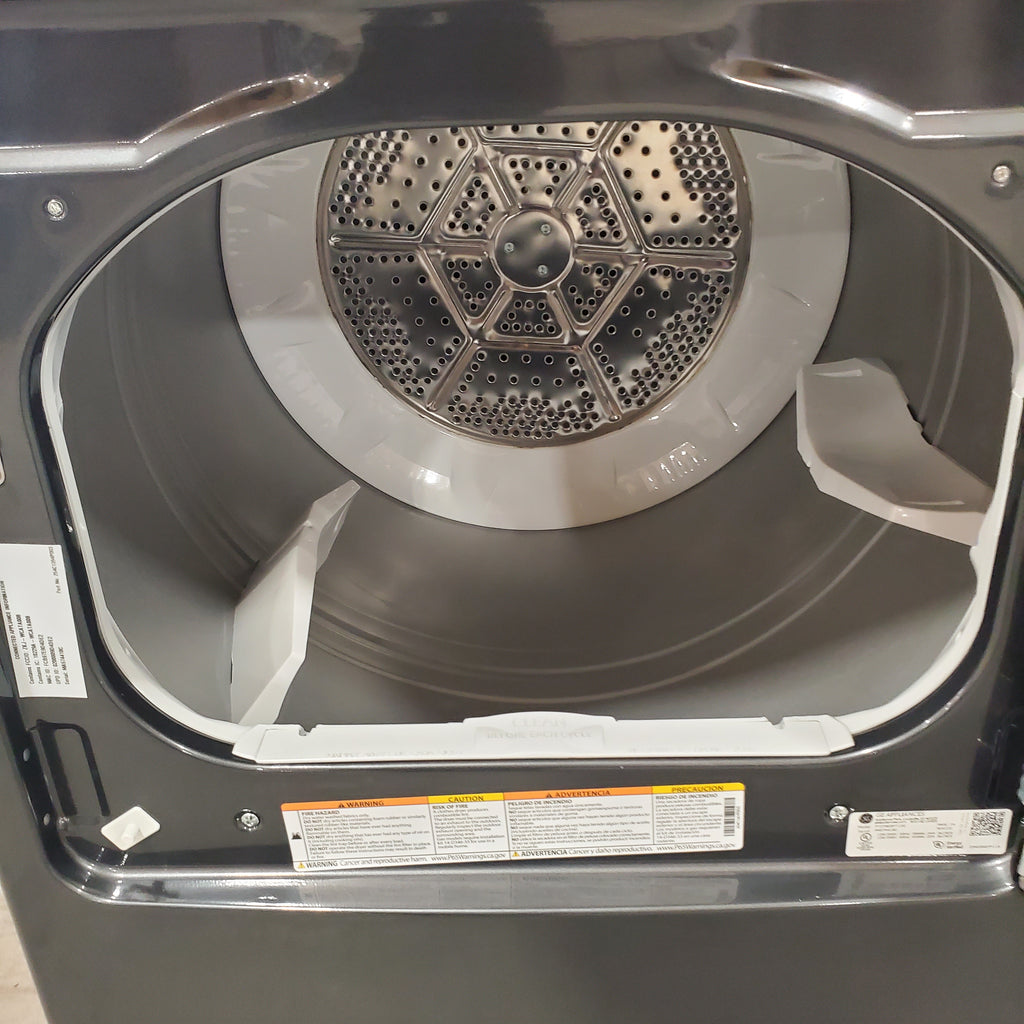 GE Profile 5.4 cu. ft. Top Load Washing Machine with FlexDispense PTW700BPTDG - Scratch & Dent (Minor) and GE Profile 7.4 cu. ft. Gas Dryer with Steam 16041 - PTD70EBPTDG - Open Box