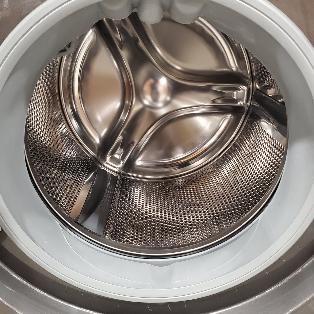 Electrolux Titanium Front Load 600 Series 4.5 Cu. Ft. Washer with Smartboost ELFW7637AT - Scratch & Dent (Minor) and Electrolux 8 cu. ft. vented Front Load Stackable 600 Series Electric Dryer with LuxCare Dry 16098 - ELFE7637AT - Scratch & Dent (Moderate)