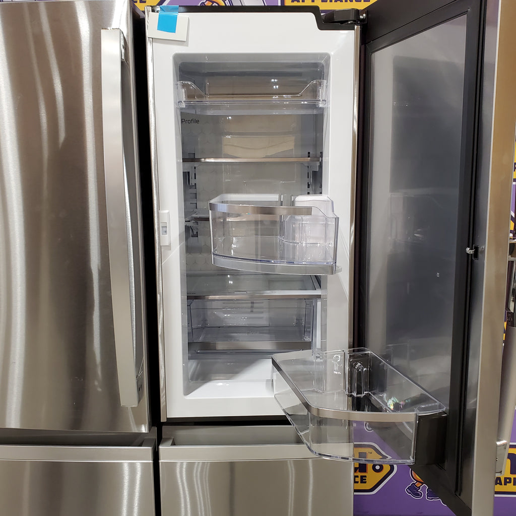 Pictures of GE Profile ENERGY STAR® 22.9 Cu. Ft. Counter-Depth Quad-Door Refrigerator with Dual-Dispense AutoFill Pitcher and Door in Door GE9851 - PHD23BYWFS - New in Box - Neu Appliance Outlet - Discount Appliance Outlet in Austin, Tx