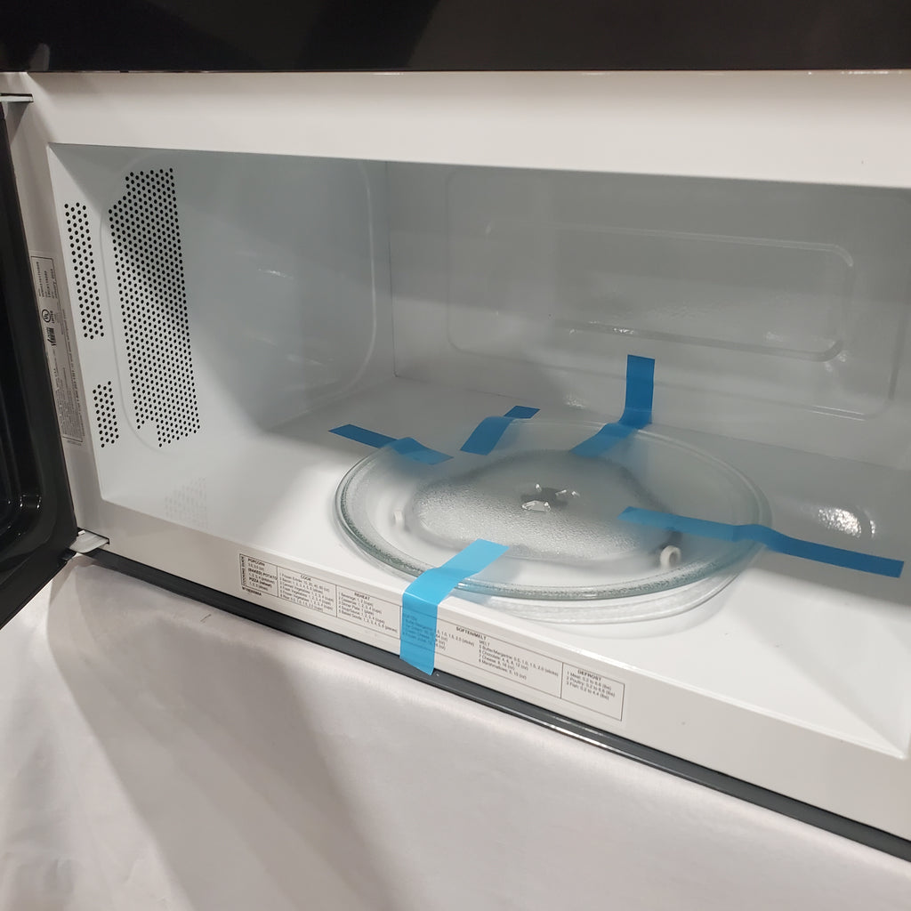 Whirlpool Hood Combination 1.7 Cu. Ft. Microwave with Electronic Touch Controls and Dishwasher Safe Turntable Plate 5SD285 - WMH31017HS - Scratch & Dent (Minor)