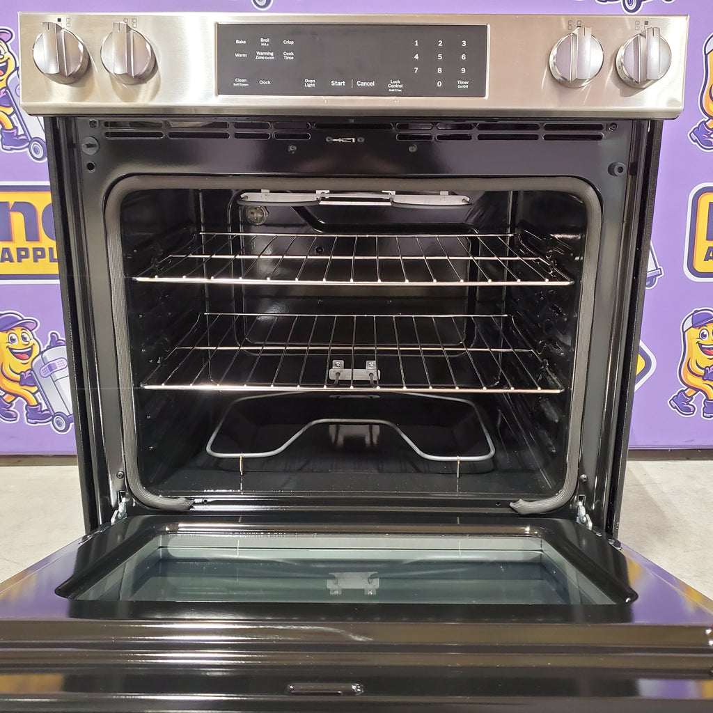 Pictures of GE® Stainless Steel Front Control Slide-In Electric Range with Crisp Mode and 5 Burner Radiant Cooktop 251310SD910 - GRS500PV2SS - Scratch & Dent (Minor) - Neu Appliance Outlet - Discount Appliance Outlet in Austin, Tx