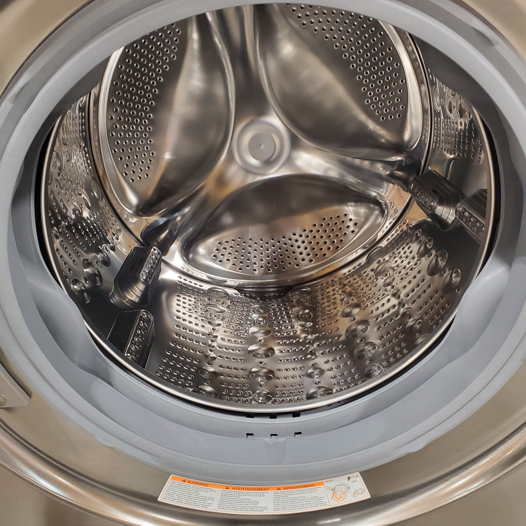Pictures of LG Graphite Steel Front Load WashTower Single Unit with Center Controls 4.5 Cu. Ft. Washer and 7.4 Cu. Ft. Dryer 6SD129 - WKE100HVA - Scratch & Dent (Minor) - Neu Appliance Outlet - Discount Appliance Outlet in Austin, Tx