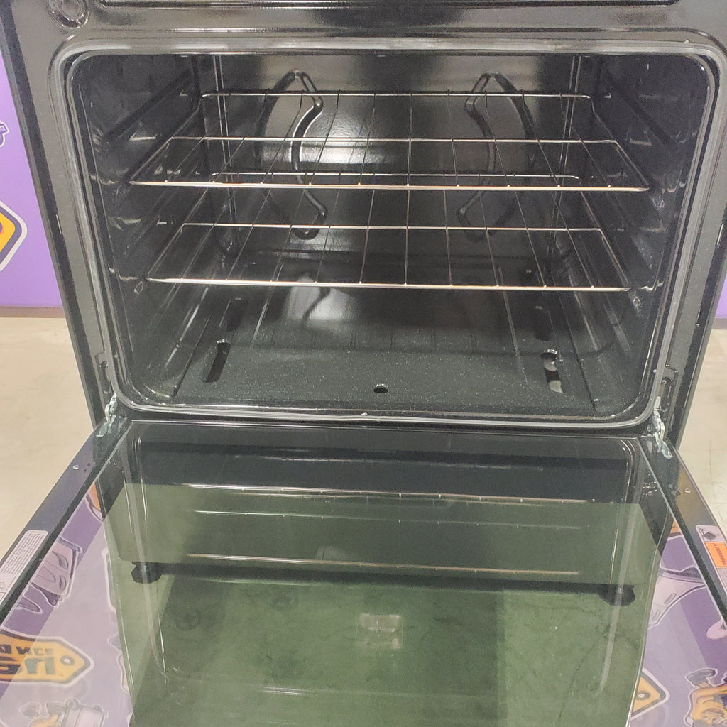 Whirlpool 5.1 Cu. Ft. Freestanding Gas Range with Edge to Edge Cooktop WFG505M0MS - Scratch and Dent (Minor)