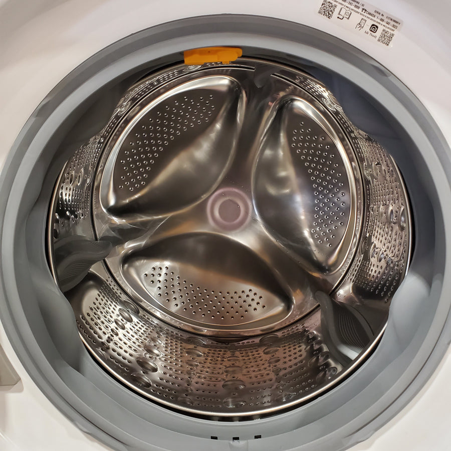 LG 4.5 cu. ft. Front Load Washer with Steam and Built-In Intelligence in White WM4000HWA - Scratch & Dent (Minor) and LG 7.4 cu. ft. Front Load Electric Dryer with TurboSteam and Sensor Dry Technology in White 16237 - DLEX4000W - Scratch & Dent (Moderate)