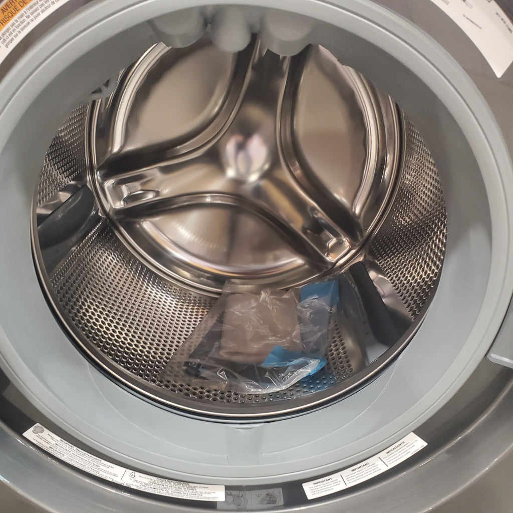 Pictures of Electrolux Titanium Front Load 600 Series 4.5 Cu. Ft. Washer with Smartboost ELFW7637AT - Scratch & Dent (Minor) and Electrolux 8 cu. ft. vented Front Load Stackable 600 Series Electric Dryer in Titanium with LuxCare Dry 16032 - ELFE7637AT - New in Box - Neu Appliance Outlet - Discount Appliance Outlet in Austin, Tx
