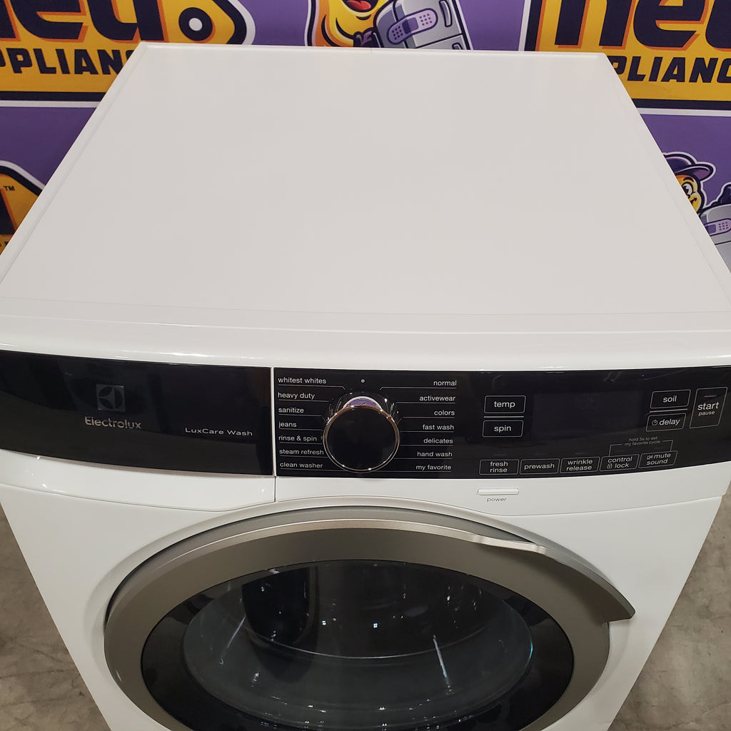 Electrolux 24" Wide Compact Front Load 2.4 cu ft Washer with LuxCare Wash System and Steam Refresh Cycle ELFW4222AW - Scratch & Dent (Minor) and Electrolux 24" 4.0 cu. ft. Compact Electric Dryer 15033 - ELFE4222AW - Scratch & Dent (Minor)