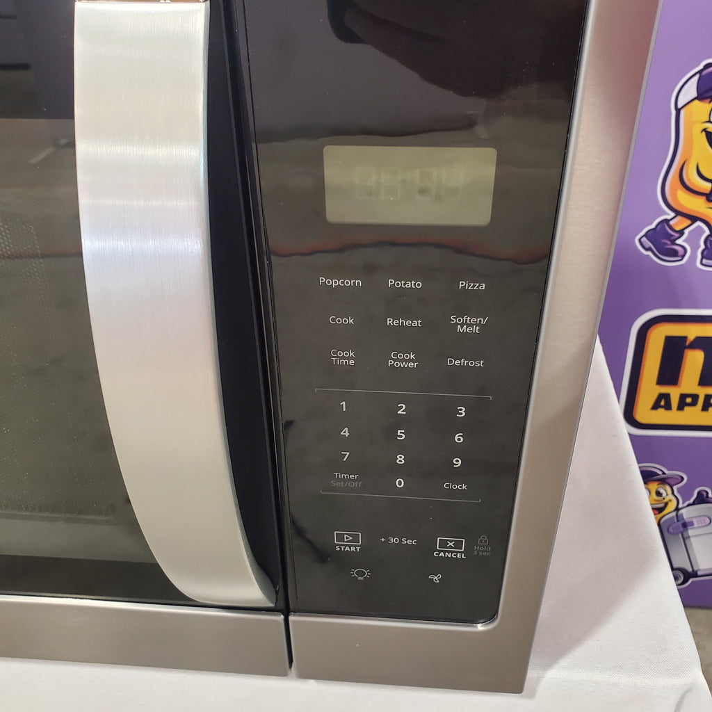 Pictures of Whirlpool 1.7 cu. ft. Microwave Hood Combination with Electronic Touch Controls 17SD229 - WMH31017HZ - Scratch & Dent (Minor) - Neu Appliance Outlet - Discount Appliance Outlet in Austin, Tx