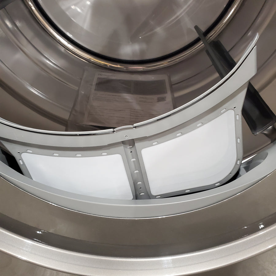 Electrolux Titanium Front Load 600 Series 4.5 Cu. Ft. Washer with Smartboost ELFW7637AT - Scratch & Dent (Moderate) and Electrolux 8 cu. ft. vented Front Load Stackable 600 Series Electric Dryer with LuxCare Dry 16248 - ELFE7637AT - Scratch & Dent (Minor)